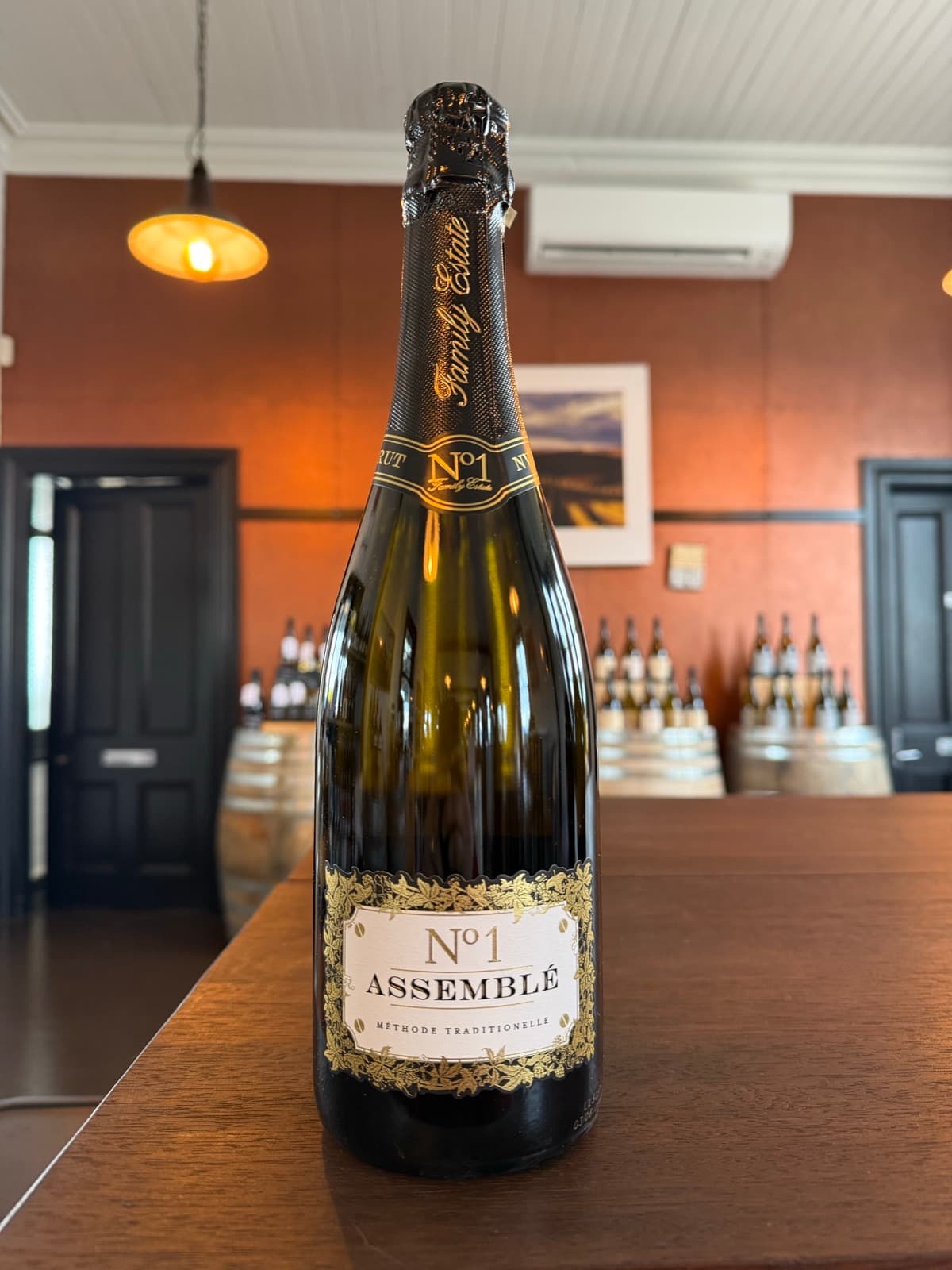Sparkling wine being poured into a tall glass